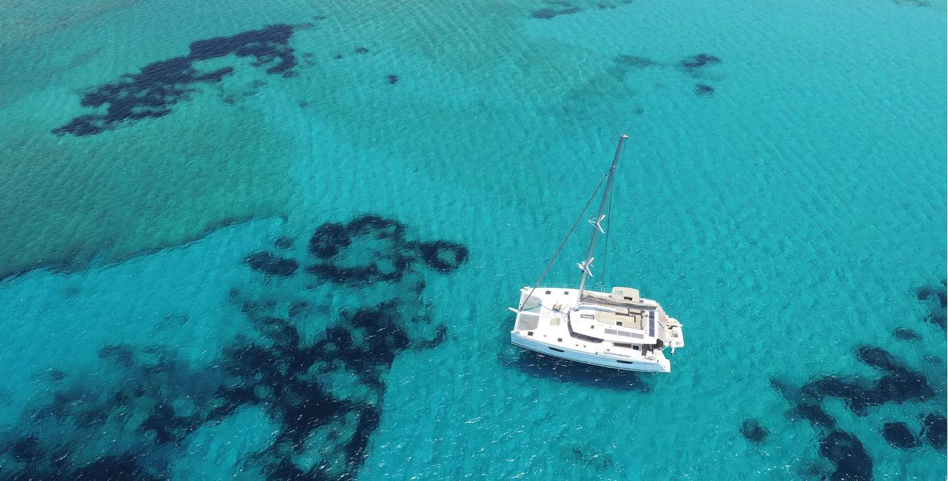 Lady Roslyn near reef waters